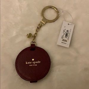 Burgundy Kate Spade mirror keychain